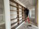 Custom-built bookshelves being installed, offering ample storage and display space for a living area at 3405 Makers Circle, Raleigh, NC 27612