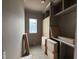 Spacious closet with custom shelving and cabinetry awaits your personal touch and organization at 3405 Makers Circle, Raleigh, NC 27612
