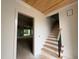Stairway leading to the second floor and an open view into another room at 3405 Makers Circle, Raleigh, NC 27612