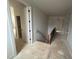 Hallway with stairway that features a view and light fixtures at 3405 Makers Circle, Raleigh, NC 27612