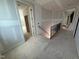 Unfinished hallway features a staircase with dark metal railings at 3405 Makers Circle, Raleigh, NC 27612