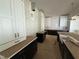 Newly installed kitchen featuring a large farmhouse sink, modern cabinetry, and subway tile at 3405 Makers Circle, Raleigh, NC 27612
