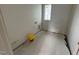 Unfinished laundry room with utility hook-ups, providing convenience and practicality for household tasks at 3405 Makers Circle, Raleigh, NC 27612