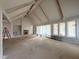 Bright living room featuring a fireplace, built-in shelves and large windows at 3405 Makers Circle, Raleigh, NC 27612