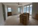 Bright living room with three large windows bringing in natural light and views of the outdoors at 3405 Makers Circle, Raleigh, NC 27612