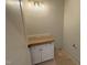 New vanity with white cabinets, gold fixtures, and marble countertop, awaiting final installation at 3405 Makers Circle, Raleigh, NC 27612