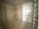 Large walk-in closet featuring custom shelves and ample hanging space, perfect for organizing your wardrobe at 3405 Makers Circle, Raleigh, NC 27612