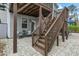 Inviting backyard space with a raised deck and stair access to the home and patio areas at 3548 Willow Green Dr, Apex, NC 27502