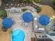 Aerial of the outdoor kitchen, inground pool, patio, and other backyard features at 3548 Willow Green Dr, Apex, NC 27502