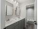 Bathroom features marble countertops, double sinks, and a shower/tub combo at 3548 Willow Green Dr, Apex, NC 27502