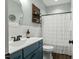 Well-lit bathroom featuring a stylish vanity, white subway tile, and coordinated decor at 3548 Willow Green Dr, Apex, NC 27502