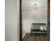 Inviting foyer with bench seating, decorative lighting, and a welcoming atmosphere at 3548 Willow Green Dr, Apex, NC 27502
