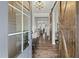 Elegant foyer with hardwood floors, decorative lighting, and inviting view into the living spaces at 3548 Willow Green Dr, Apex, NC 27502