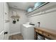 Convenient laundry room with washer, dryer, and shelving at 3548 Willow Green Dr, Apex, NC 27502