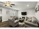 Bright living room showcases comfortable seating, a fireplace, and an open layout perfect for gatherings at 3548 Willow Green Dr, Apex, NC 27502