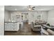 Inviting living room connected to the kitchen featuring neutral tones, and seamless entertaining at 3548 Willow Green Dr, Apex, NC 27502