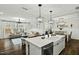 Bright open floor plan with spacious living room and kitchen with granite countertops at 3548 Willow Green Dr, Apex, NC 27502