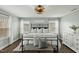 Bedroom with large windows, a decorative ceiling fan and ample natural light at 3548 Willow Green Dr, Apex, NC 27502