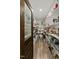 Walk-in pantry with shelving and ample storage space, behind a decorative pantry door at 3548 Willow Green Dr, Apex, NC 27502