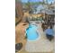 An overhead shot displays a luxurious pool, patio and backyard with a screened-in porch at 3548 Willow Green Dr, Apex, NC 27502