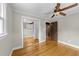 This bedroom features hardwood floors and a mirrored closet at 412 N Cheatham St, Franklinton, NC 27525