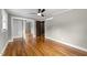 This bedroom features hardwood flooring and a large walk-in closet at 412 N Cheatham St, Franklinton, NC 27525