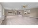 A large living room with lots of space, natural light, and nice flooring at 412 N Cheatham St, Franklinton, NC 27525