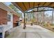 The backyard patio offers outdoor living space with custom concrete at 412 N Cheatham St, Franklinton, NC 27525