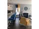 Living space featuring modern seating, bar stools, and a decorative fireplace with tasteful decor at 433 Falling Brook Dr, Kenly, NC 27542