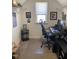 Bright home office with a window view, built-in shelving, and a neutral color scheme at 433 Falling Brook Dr, Kenly, NC 27542