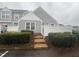 Charming townhome with manicured landscaping, neutral siding, and a welcoming entryway at 5054 Avenida Del Sol Dr, Raleigh, NC 27616