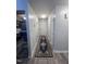 Hallway with wood flooring and white trim at 5054 Avenida Del Sol Dr, Raleigh, NC 27616