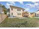 Large backyard includes a screened-in porch, patio, and grassy area with ample room for recreation at 5072 Aspen Meadow St, Raleigh, NC 27616