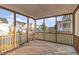 Covered porch boasting wooden railings and serene neighborhood views at 5072 Aspen Meadow St, Raleigh, NC 27616