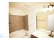 Neutral bathroom with tiled shower and large mirror at 525 Rockcastle Dr, Cary, NC 27519
