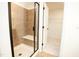 Bathroom with tiled shower and open doorway at 525 Rockcastle Dr, Cary, NC 27519