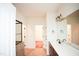Bathroom with tile floor, vanity and a glass shower at 525 Rockcastle Dr, Cary, NC 27519