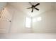 Spacious bedroom featuring plush carpet, bright windows, and neutral decor at 525 Rockcastle Dr, Cary, NC 27519