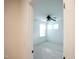 Bright bedroom with plush carpet, a ceiling fan and natural light at 525 Rockcastle Dr, Cary, NC 27519