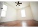 Bedroom featuring hardwood floors, ceiling fan, and natural light at 525 Rockcastle Dr, Cary, NC 27519