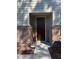 This beautiful front door is framed with brick columns and features sidelight windows at 525 Rockcastle Dr, Cary, NC 27519