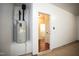 Garage featuring a water heater, and laundry room access at 525 Rockcastle Dr, Cary, NC 27519