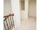 Hallway with plush carpet and wooden railing at 525 Rockcastle Dr, Cary, NC 27519