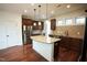 Modern kitchen with granite countertops, stainless steel appliances, and a central island perfect for entertaining at 525 Rockcastle Dr, Cary, NC 27519