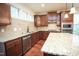Granite countertops, stainless steel appliances, and a central island that provides ample workspace at 525 Rockcastle Dr, Cary, NC 27519