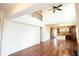 Spacious living room boasts hardwood floors, natural light, and an open layout that flows into the kitchen at 525 Rockcastle Dr, Cary, NC 27519