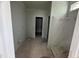 Unfinished bathroom features stud walls, toilet plumbing, and small window at 5344 Salem Woods Dr # 20, Graham, NC 27253