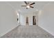 Bedroom with neutral carpet, stairs, and window at 5344 Salem Woods Dr # 20, Graham, NC 27253