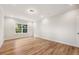 Bedroom featuring wood floors, recessed lighting and a large window with lots of light at 5344 Salem Woods Dr # 20, Graham, NC 27253