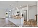 Modern kitchen featuring a large island, stainless steel appliances, and pendant lighting at 5344 Salem Woods Dr # 20, Graham, NC 27253